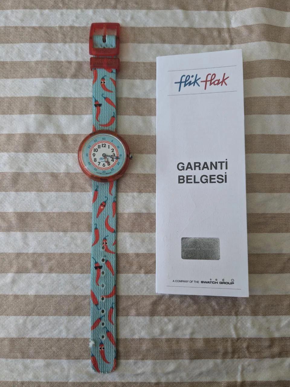 Часы Swatch Flik Flak шлем Decathlon проектор Lumicub