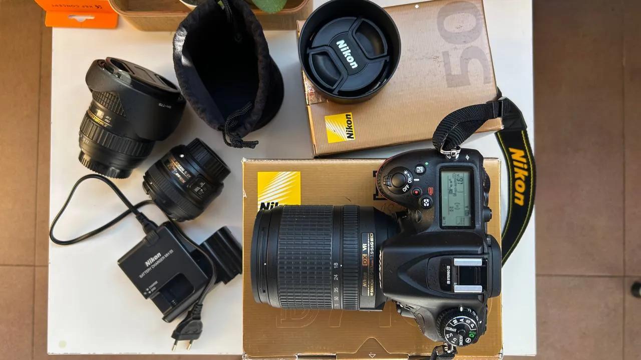 Зеркальный фотоаппарат Nikon D7100 с тремя объективами
