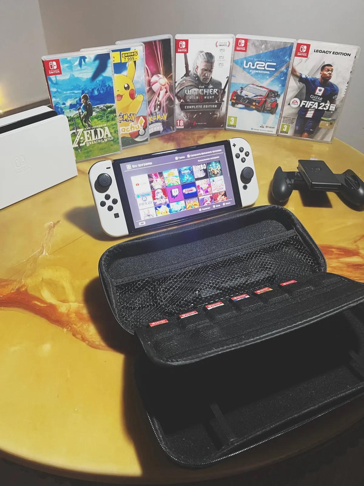 Nintendo Switch OLED с играми и аксессуарами