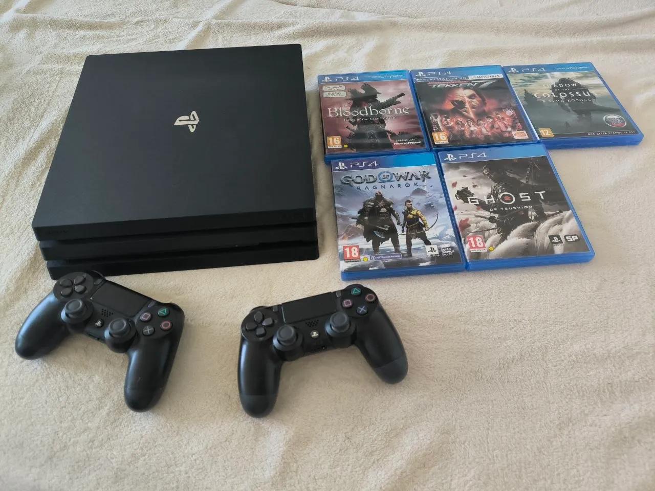 Sony PS4 Pro 1TB два геймпада пять игр