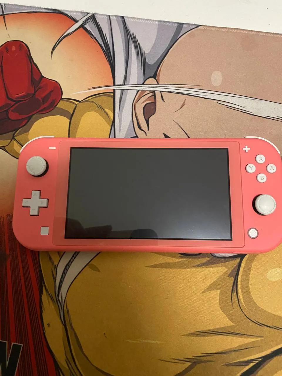 Nintendo Switch Lite розовый с картриджем