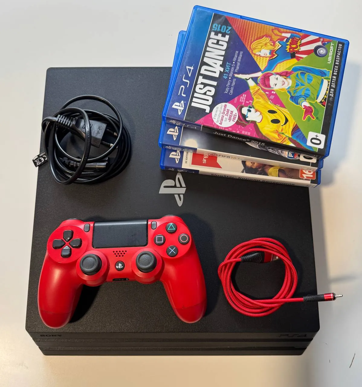 Sony PS4 Pro 1 ТБ с джойстиком и дисками 2
