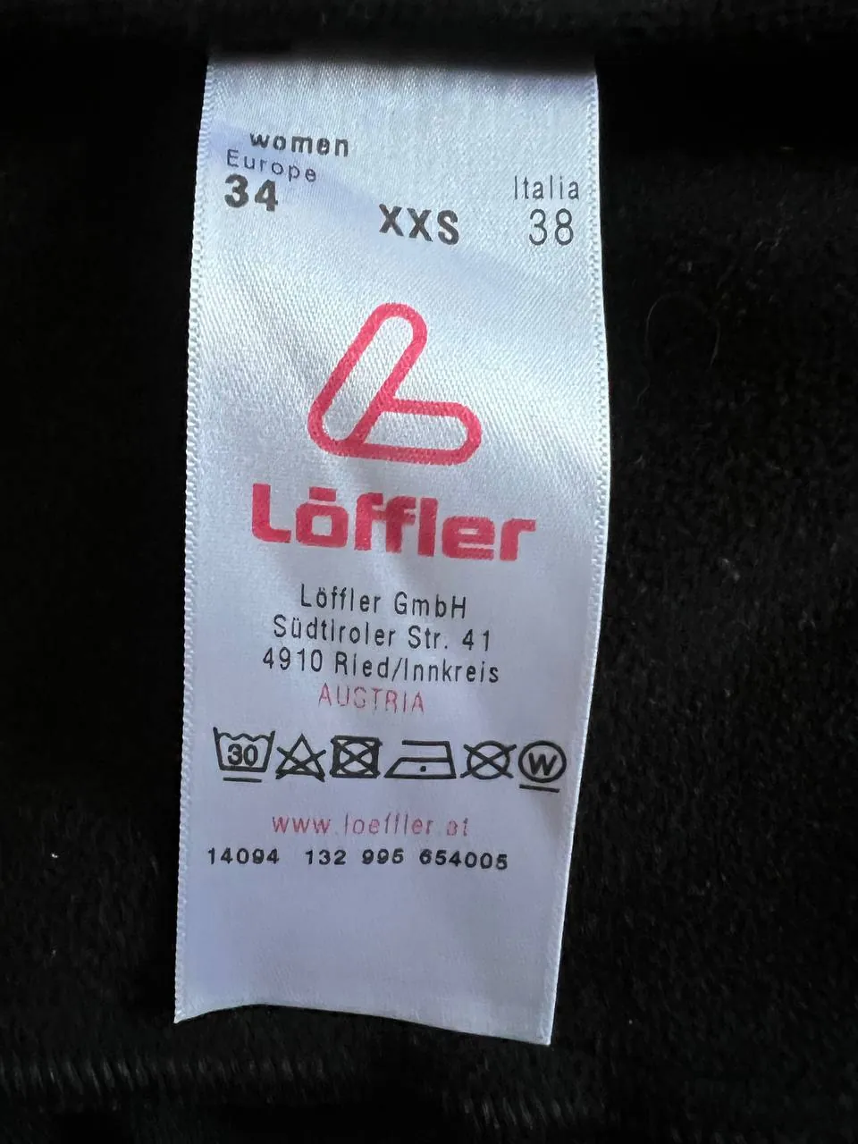 Женская спортивная жилетка Löffler и дождевик Adidas 2