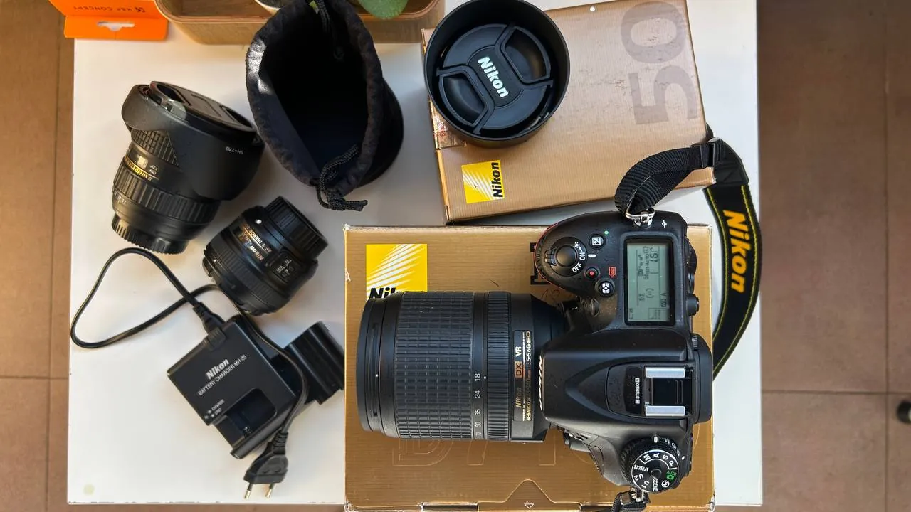Зеркальный фотоаппарат Nikon D7100 с тремя объективами 1