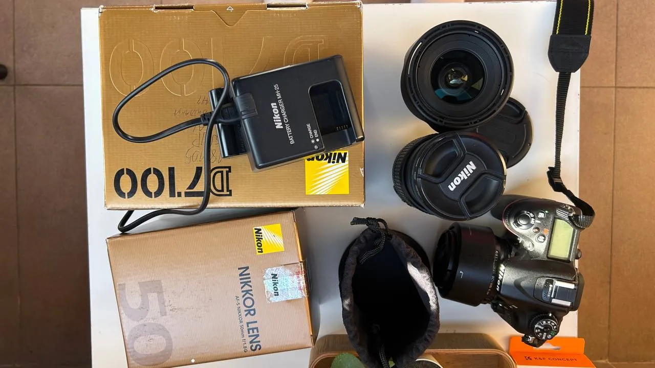 Зеркальный фотоаппарат Nikon D7100 с тремя объективами 3