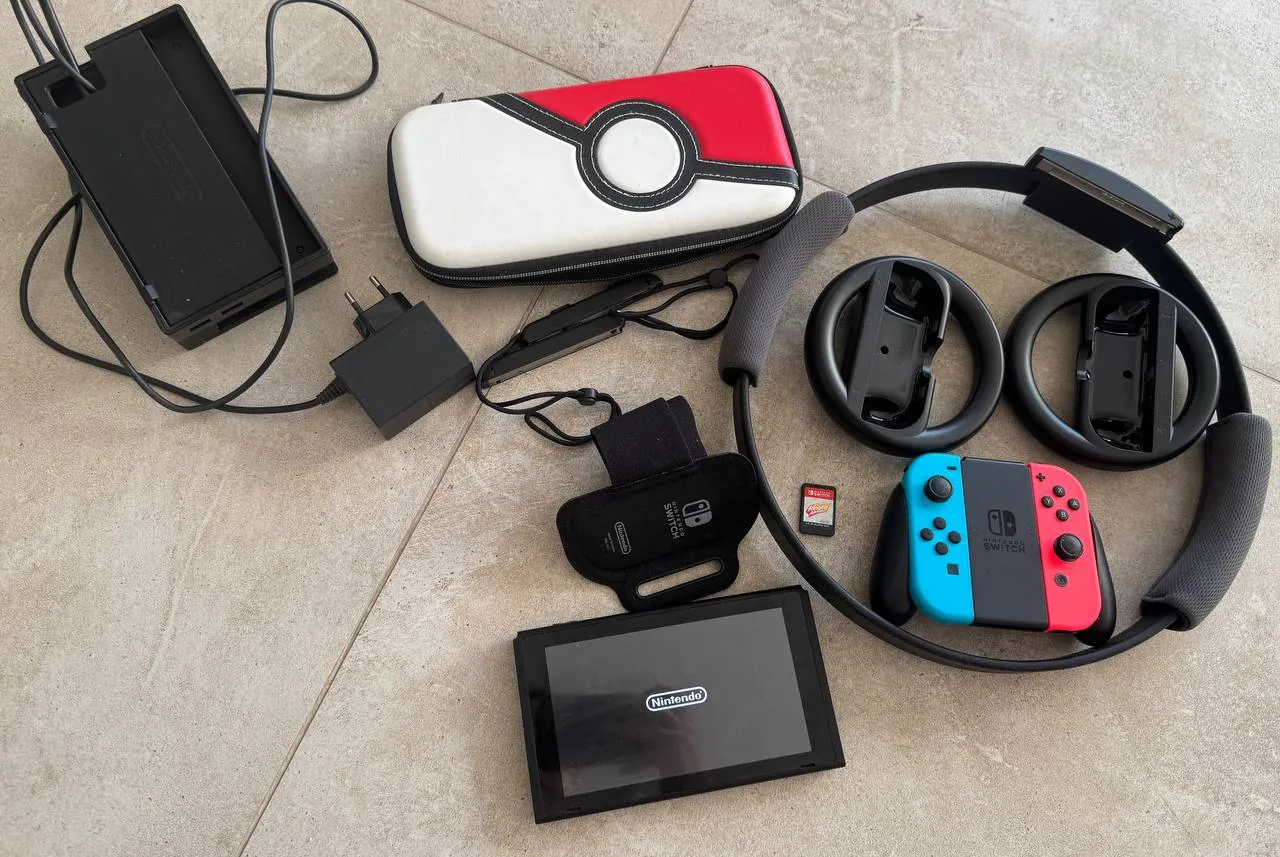 Nintendo Switch с игрой RingFit Adventure 1
