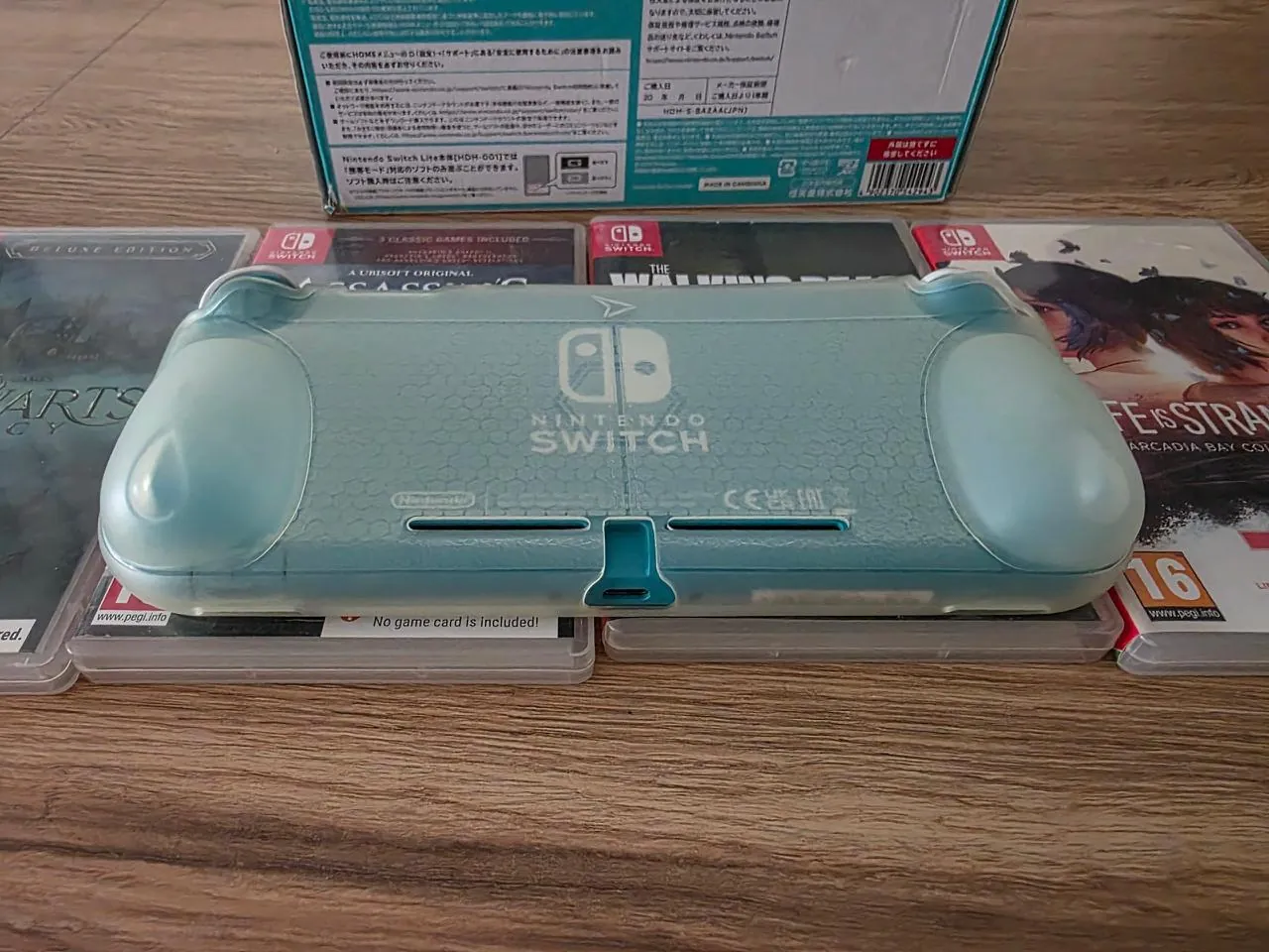 Nintendo Switch Lite с 10 играми 7