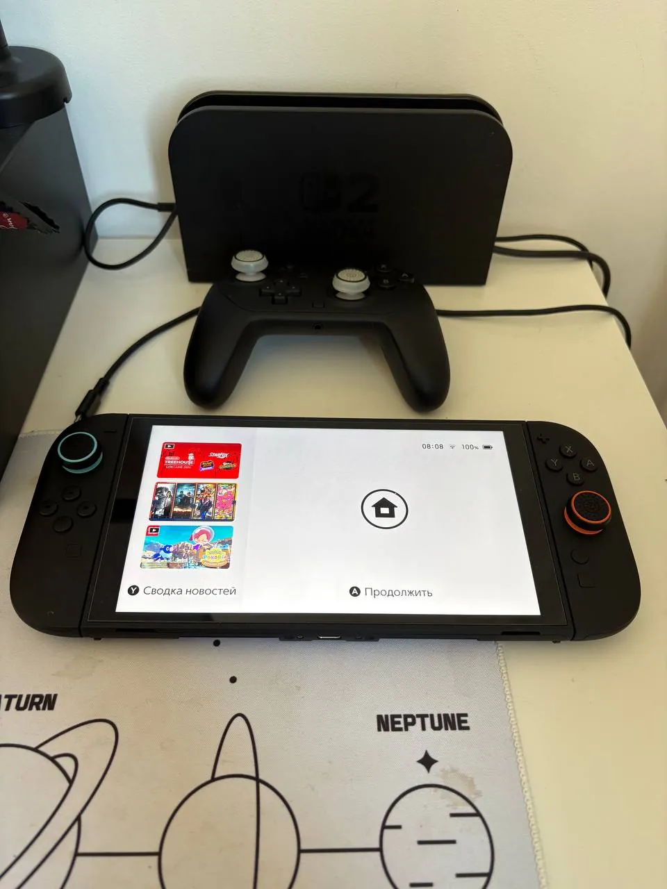 Nintendo Switch 2 с Pro Controller и игрой 1